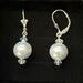 Sterling silver earring wires and pearl post.